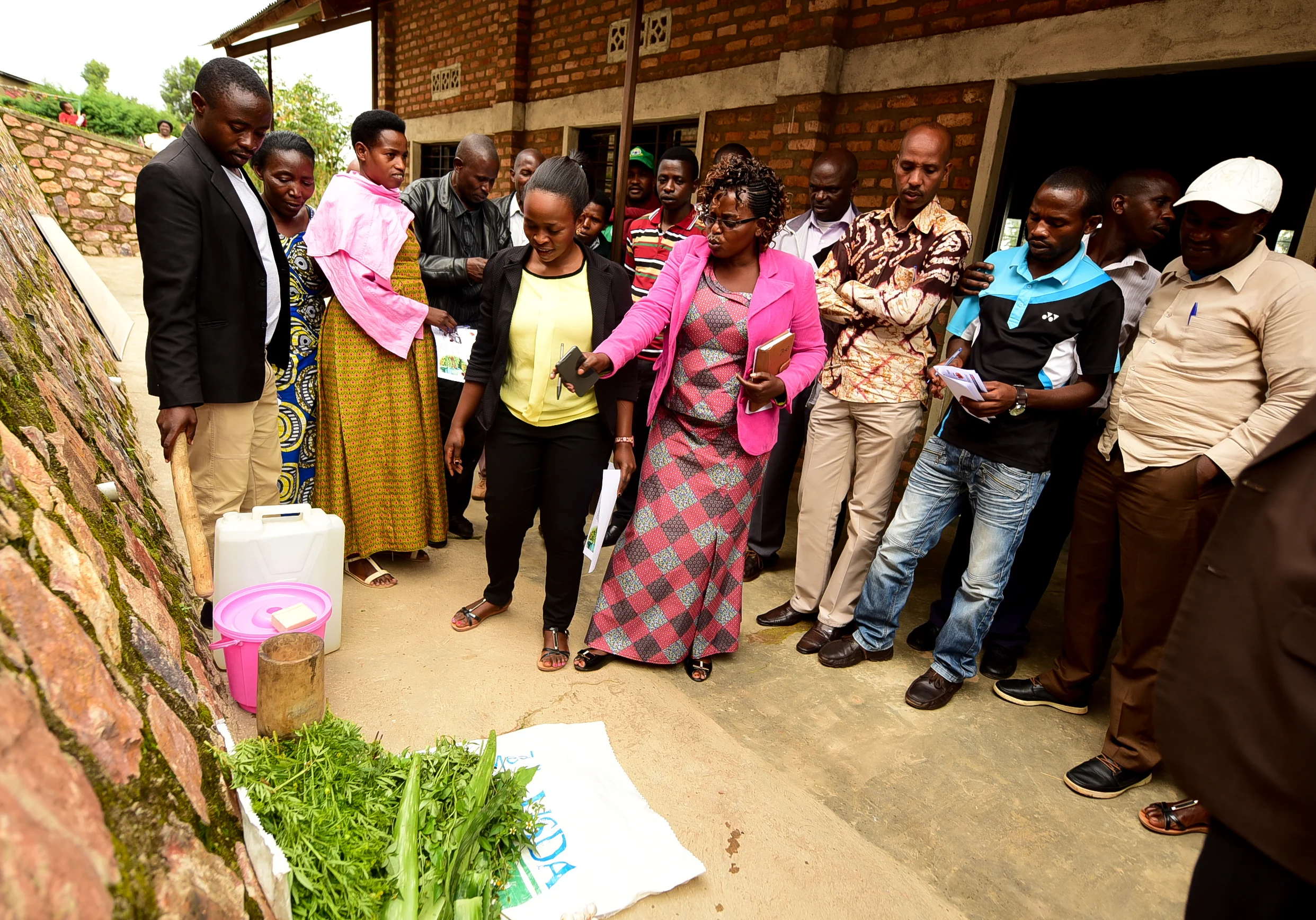 GHI Farm Manager Denyse teaches the steps of making a homemade Pili Pili pesticide.