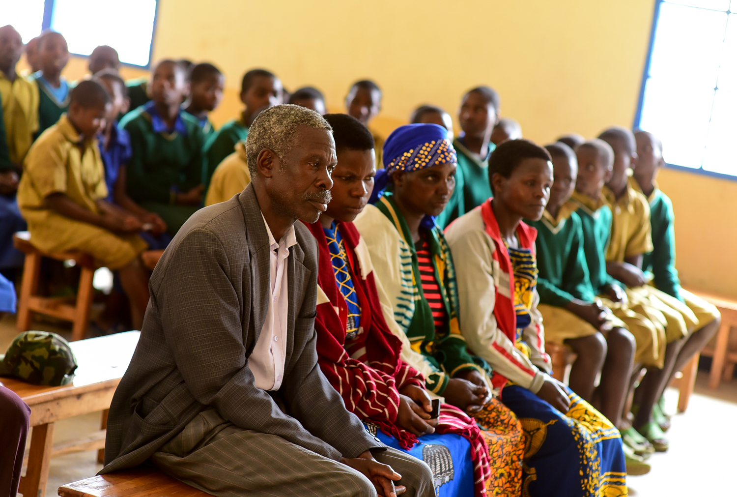 Parents at EP Rutsiro attend a nutrition training on the importance of a balanced diet taught by GHI-trained teacher Nyirabukeyengenda Marguerithe.