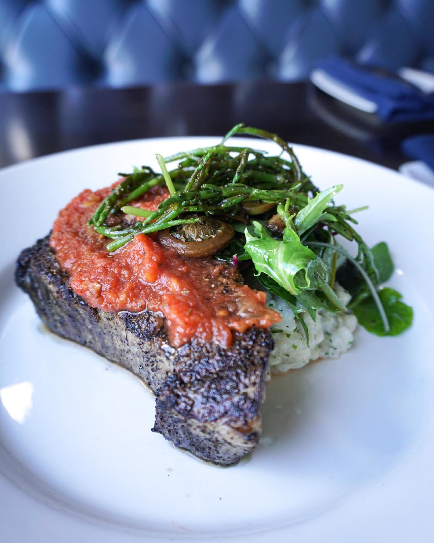 Wood Grilled Yellow Fin Tuna 🍽
Accompanied with seasonal micro greens, habanero relish, Sea beans, local fiddleheads, over a base of garlic risotto. Infused with apple wood smoke.