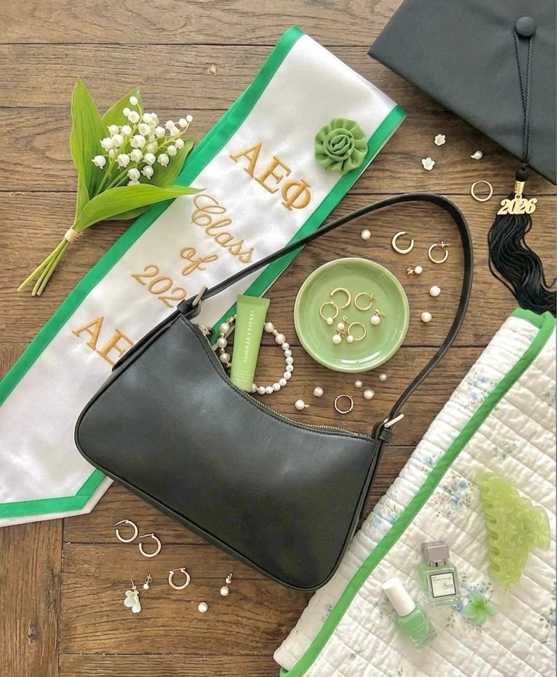 All prepped &amp; ready for graduation! Tag a senior you&rsquo;re gonna miss 💚🤍

#aephi #grad #sorority #classof2026 #gogreek