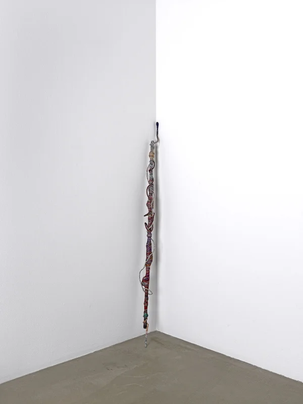 Jim Lambie Psychedelic Soul Stick 72 (2009) Woman's bead necklace, woman's bird brooch, Marlborough light packet, pawn chess piece, coloured thread, wire, bamboo cane approx. 104 x 8 x 7 cm unique