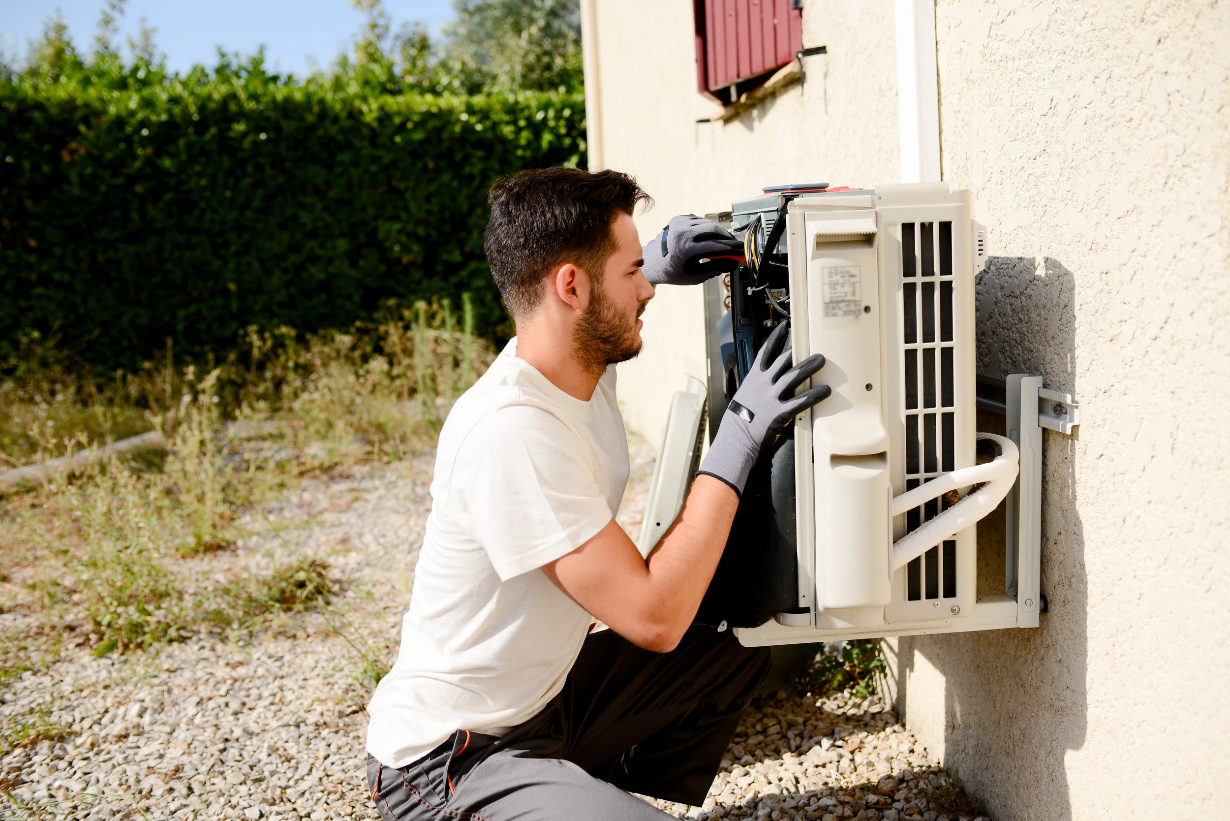 Man fixing Unit.jpg