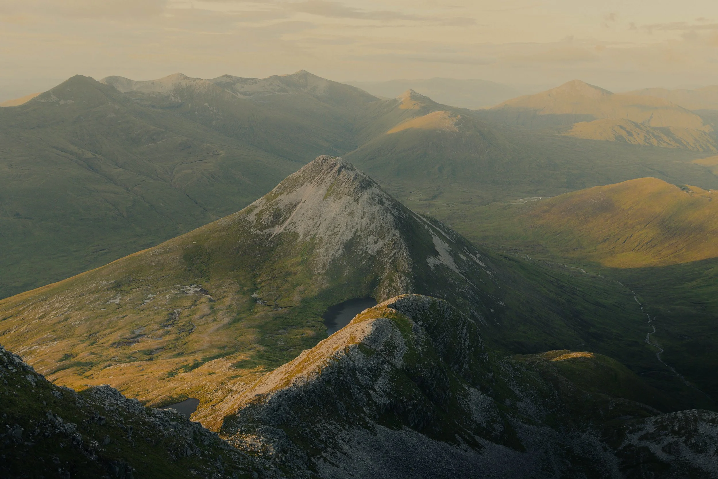 Atmospheric Scottish landscape fine art photograph by Eilidh Cameron, capturing the dramatic light and natural textures of the Highlands