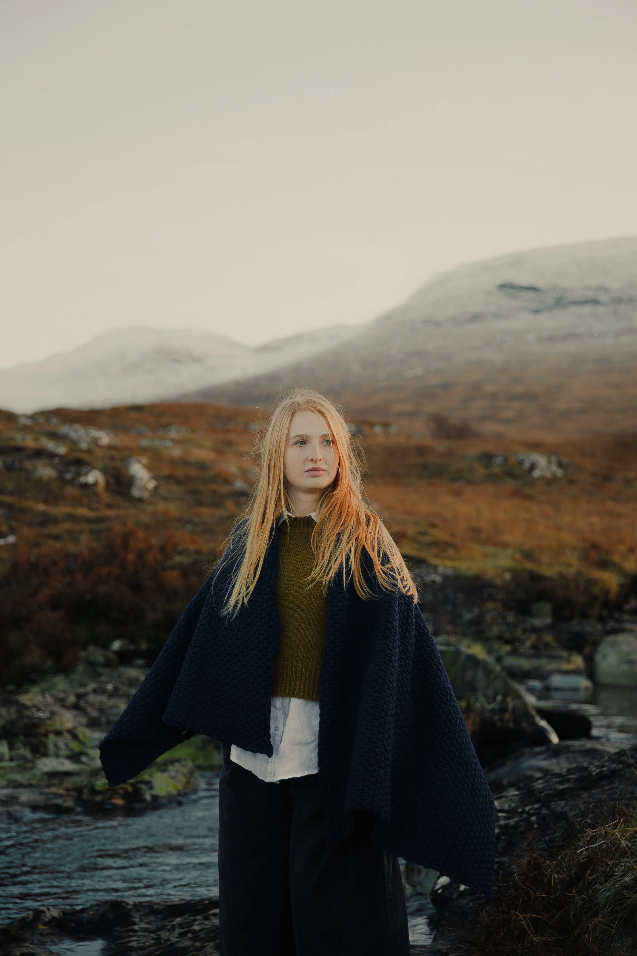 Scottish lifestyle female photographer Eilidh Cameron in islands landscape showcasing her cinematic and atmospheric photography style