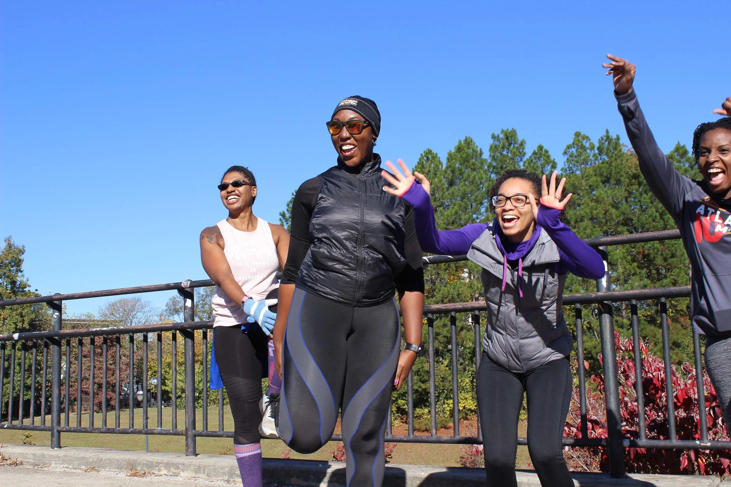 Ladies in Atlanta were excited to see one another as they warmed up for the morning run. Photo: Na’Tasha Jones for RUNGRL