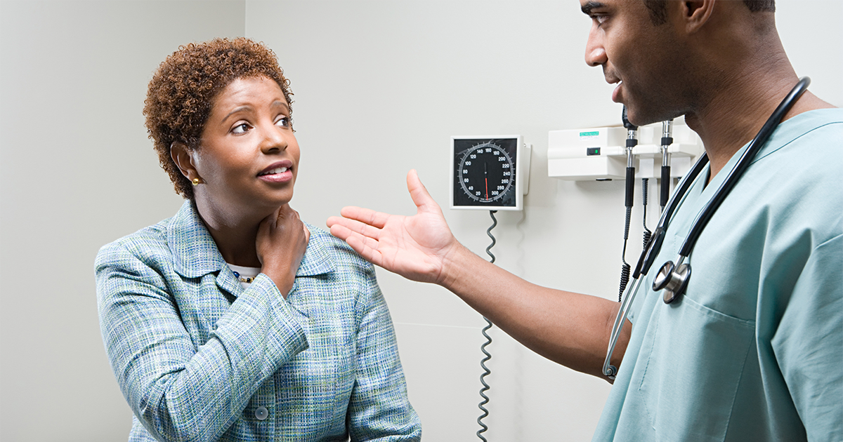 woman-talking-to-doctor.png