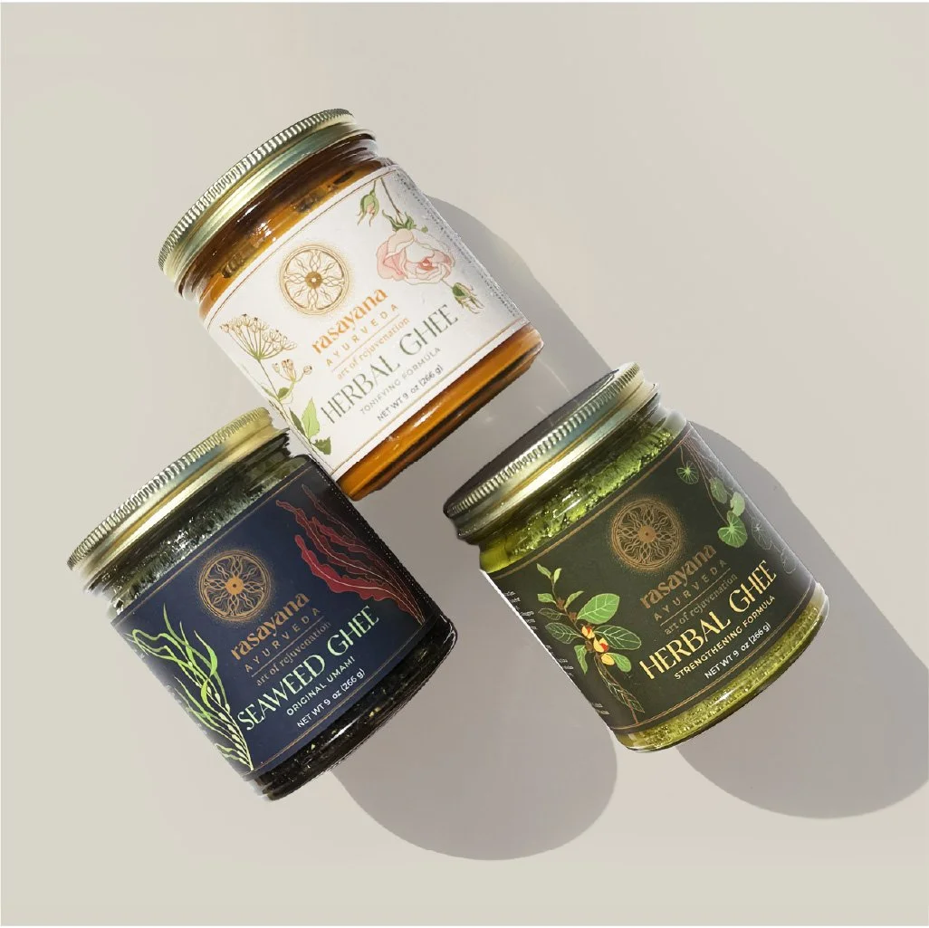 Three jars of herbal supplements from Rasayana Ayurveda, including Seaweed Ghee and Herbal Ghees.