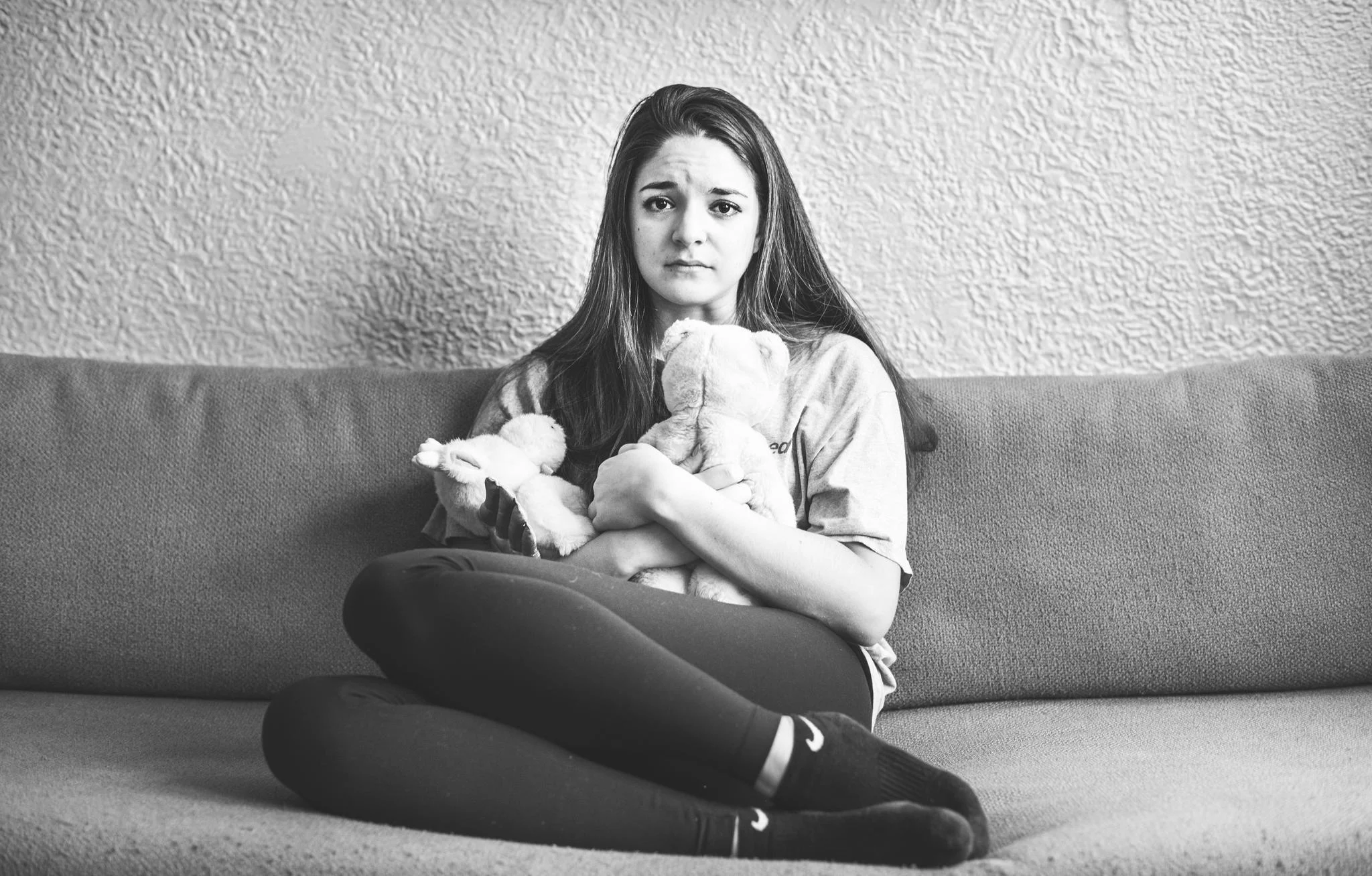 “My dad won’t be here at my graduation or to walk me down the aisle at my wedding or even hold my first child. He won’t be here at any milestone of my life. He was robbed from me and left this gaping hole that I have to mind myself” Olivia Pereze,23 holds a teddy bear that belongs to her father Anthony Pereze,Olivia's father was supposed to give her the teddy bear on her 16th birthday, instead her grandmother passed the gift after Pereze got killed during the September 11th attacks, while he was working at the North Tower on the 103rd floor. As many 9/11 victims his body was never found and as a result he was presumed dead. © Images by Eman Mohammed from Broken Souvenirs series.