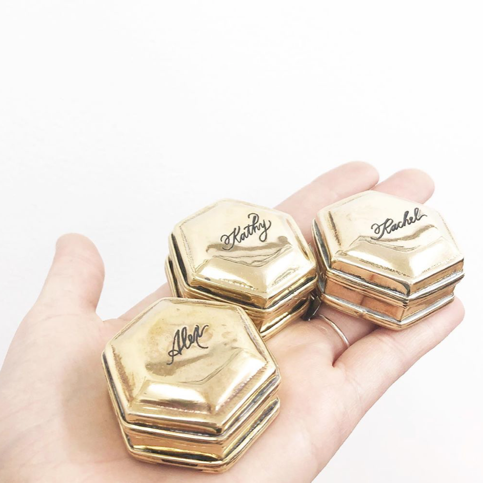 engraved brass box ring favor wedding script calligraphy hand lettering gold place setting escort card