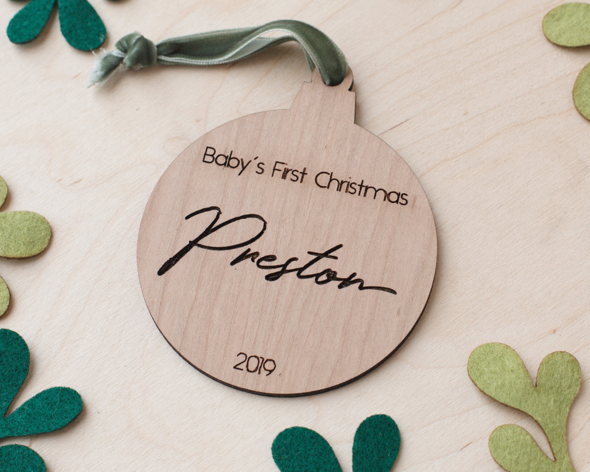 cut-etched-cherry-wood-round-bulb-babys-first-christmas-name-preston-ornament-2019.jpg
