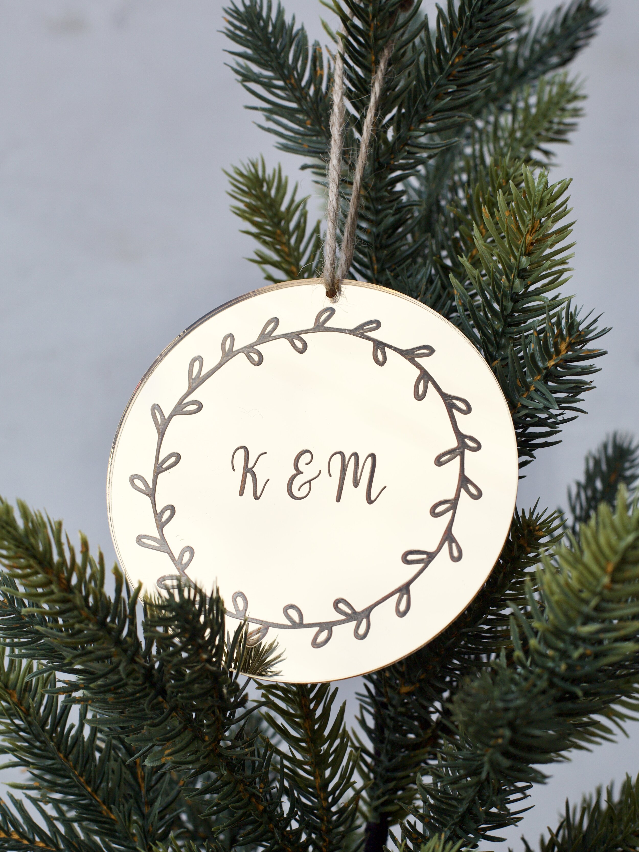 cut-etched-gold-mirrored-acrylic-round-couples-initials-k-and-m-christmas-ornament-wreath.jpg