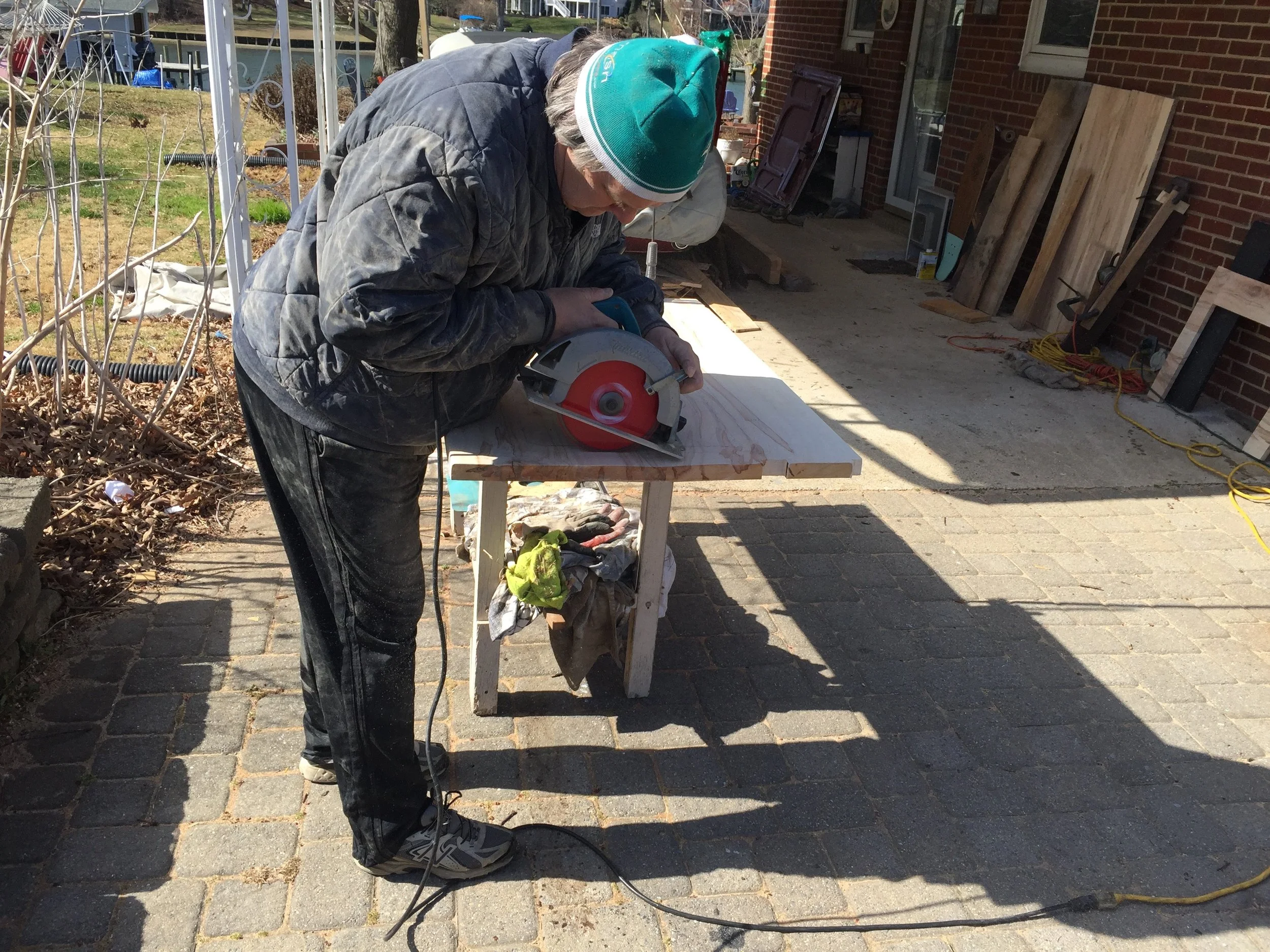 Mark starting the first cut for the hole the sink would fit into