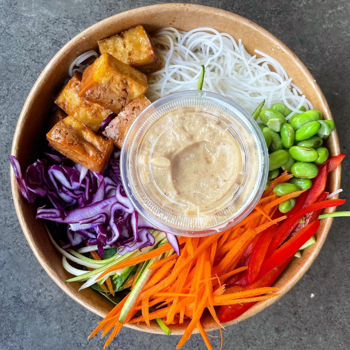 We send some pretty sexy lookin&rsquo; bowls &amp; wraps to @luminate_co in Larry Utek don&rsquo;t we?!? Well today we have a couple at the shop for those of you who are located in the North End ❤️ Pictured is the Thai Almond Noodle Bowl with @acadia