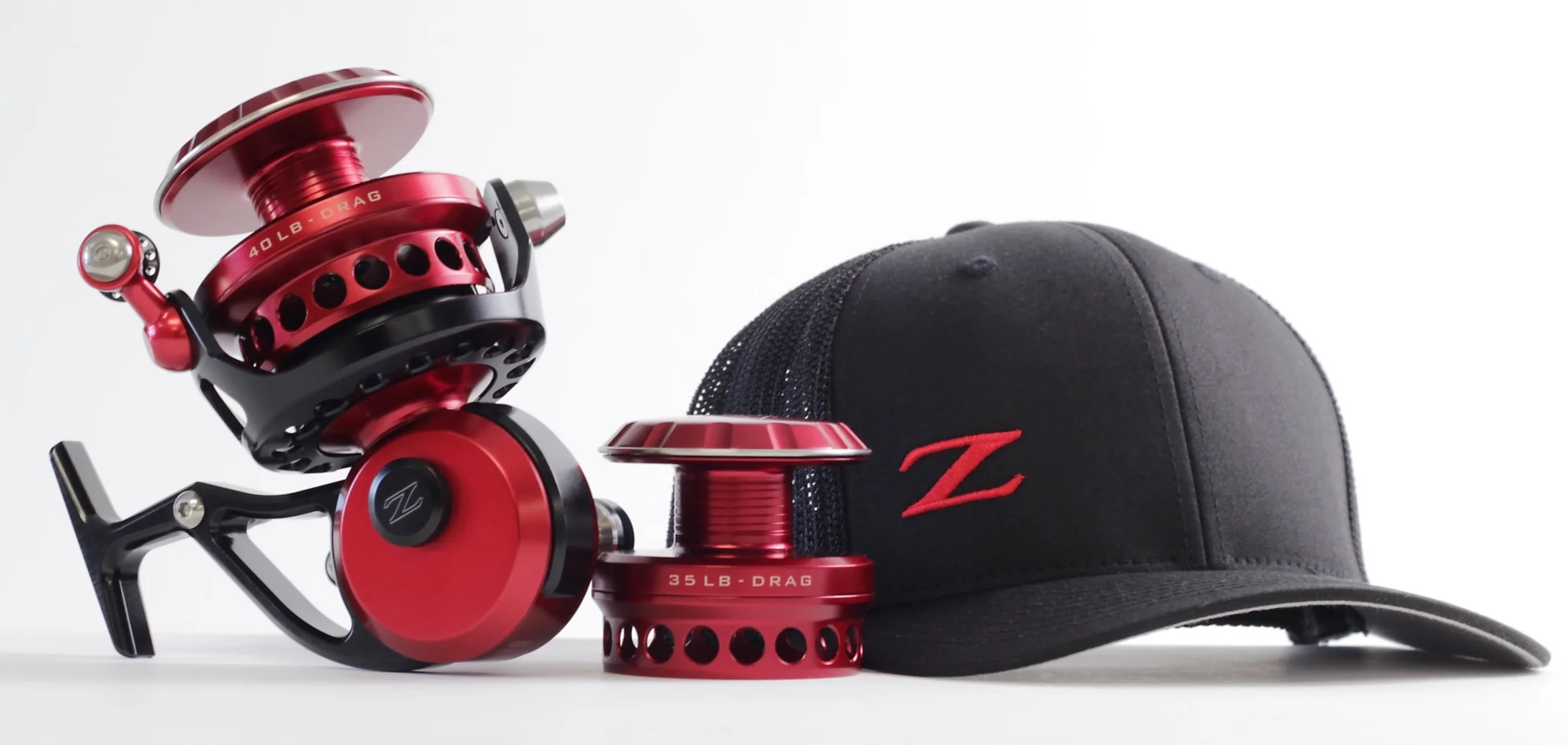 Shown above: Customers request for a Red+Black ZX-27 with custom engraving and interchangeable ZX-25 spool, and Black+Red OCEAN BOSS™ Trucker Hat.
