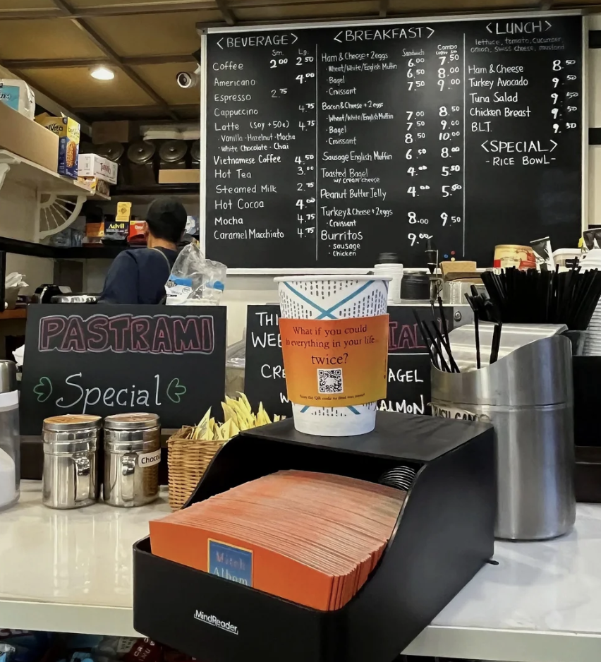 Branded coffee sleeve in a Austin cafe