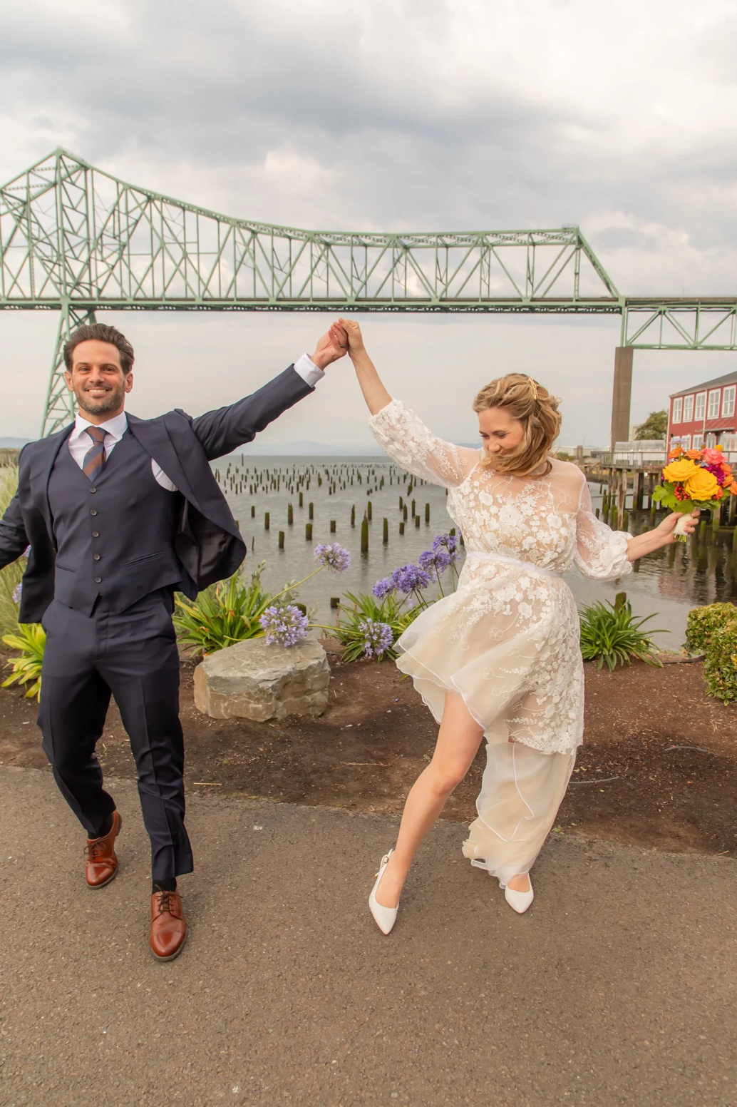 A couple embraces during an Oregon Coast elopement.