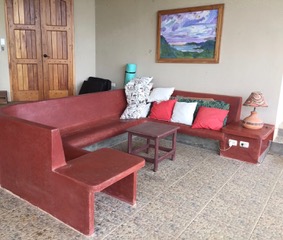 Outside living room, couch made of concrete