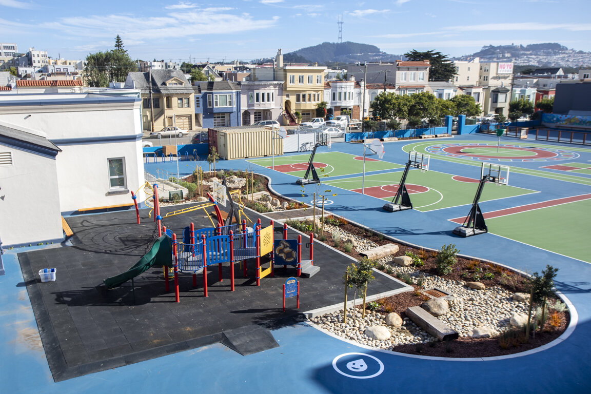 new schoolyard with dry creek bed