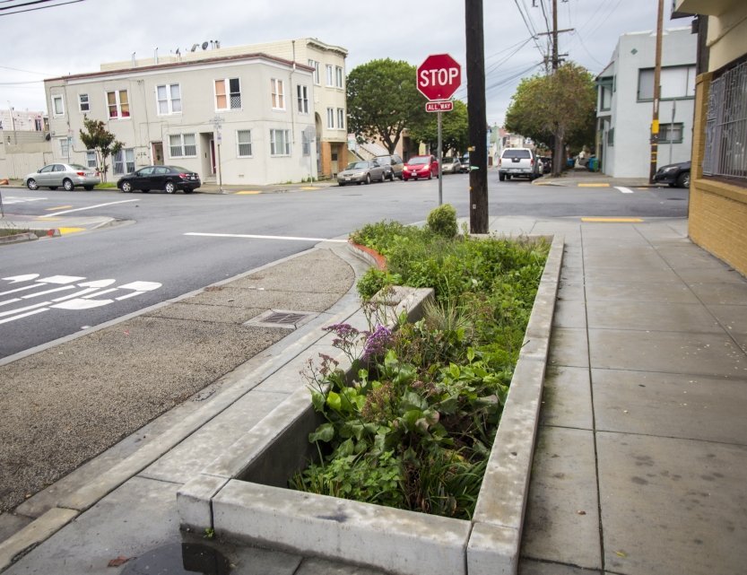 corner bulbout with bioretention and permeable pavement
