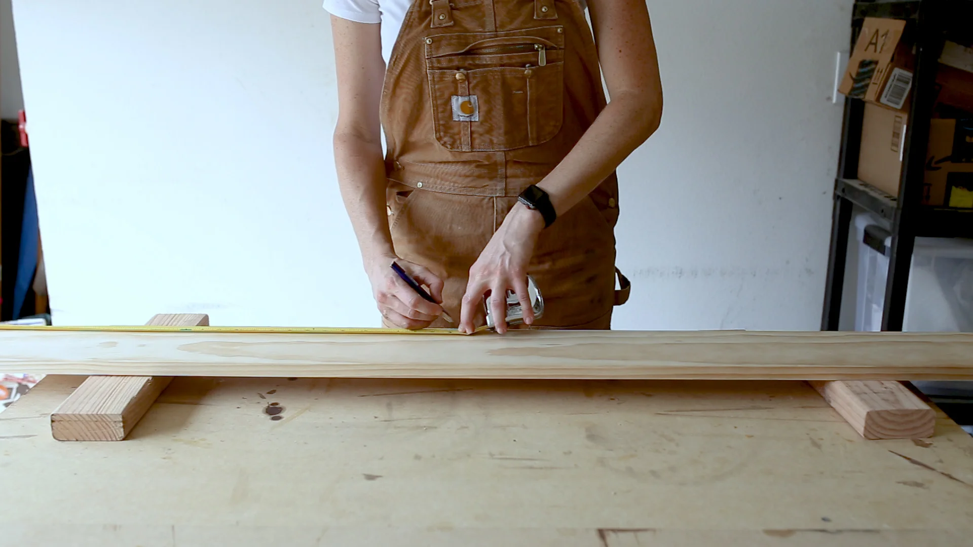 For the wood top and bottom, I picked up a 1x6 board and measured for my cuts.
