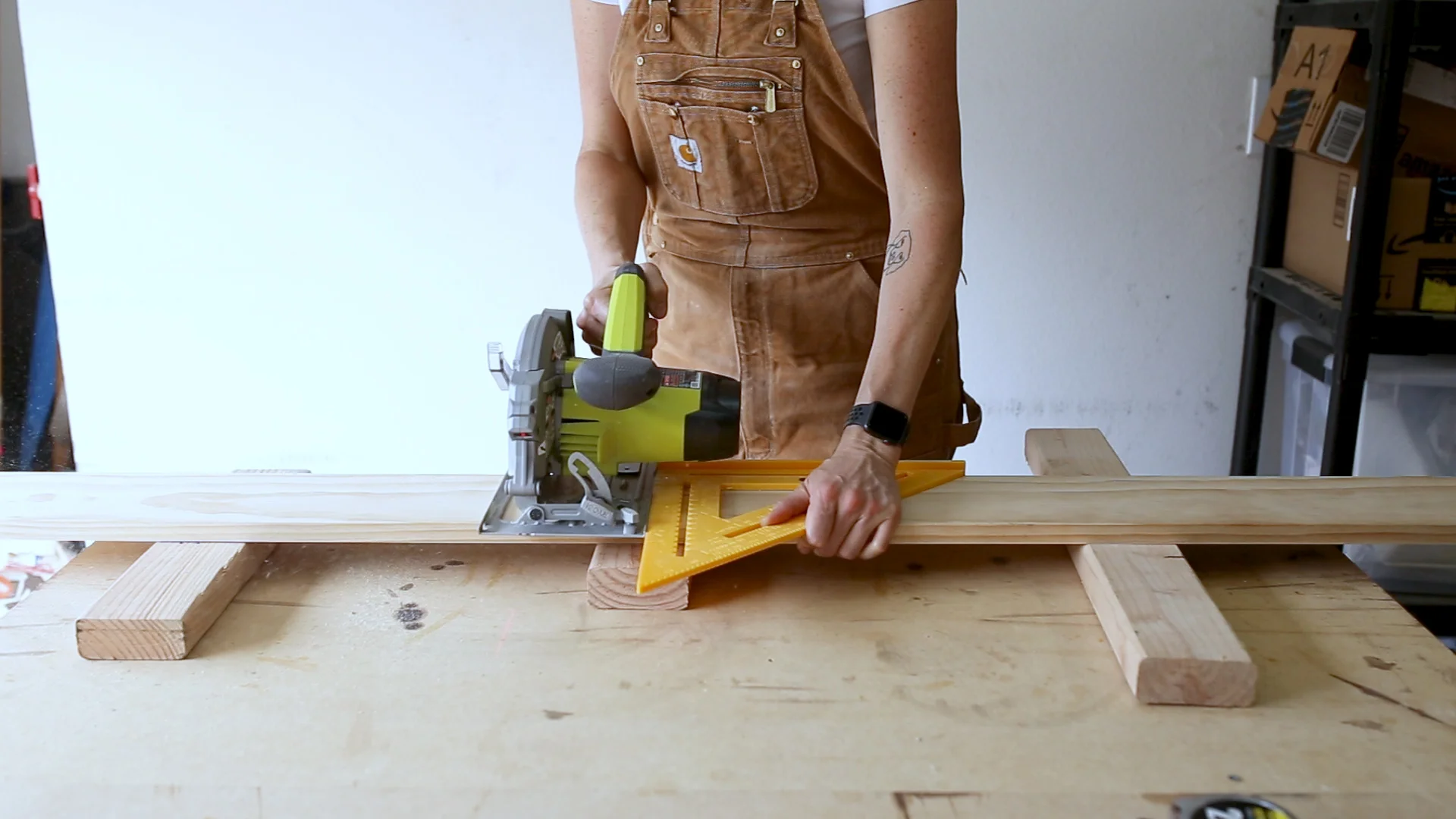 I used a Speed Square as a straight edge and cut two 26" boards with my Circular Saw .