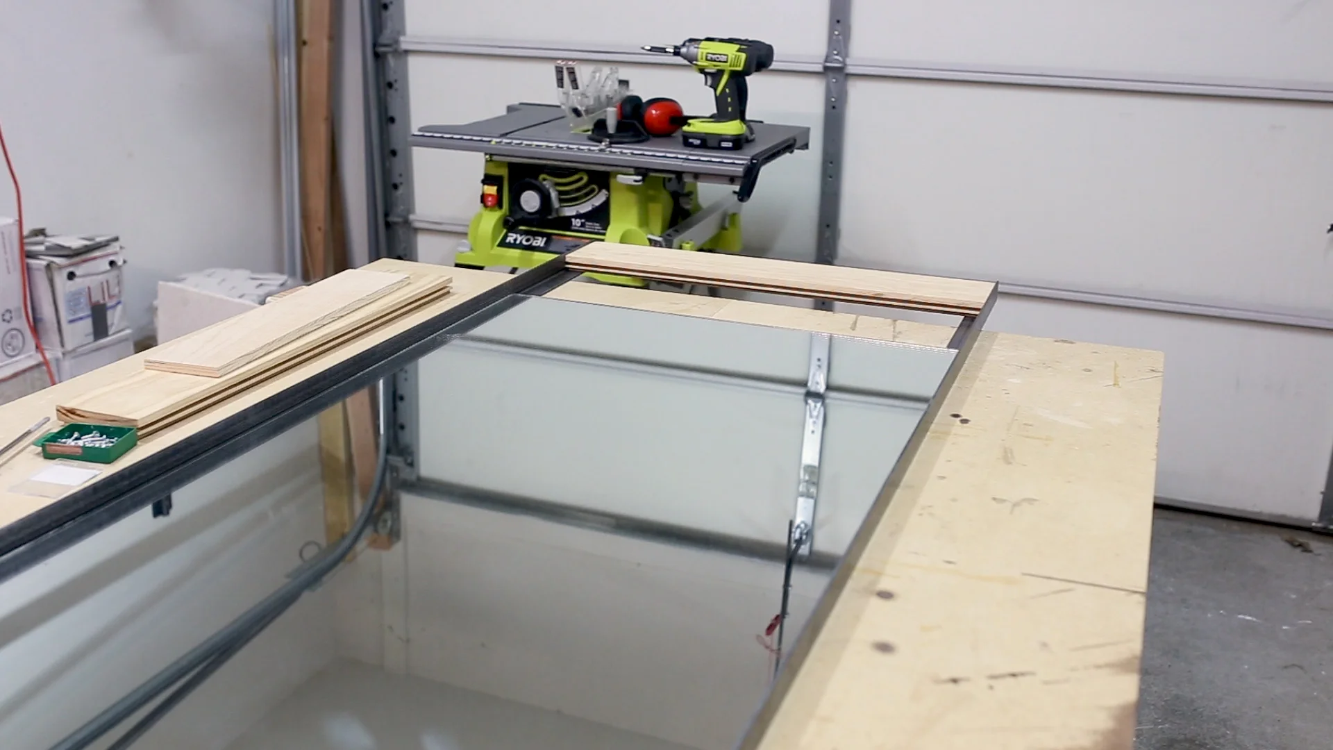 I then slid in the mirror and placed it in the dado (groove) in the wood end.