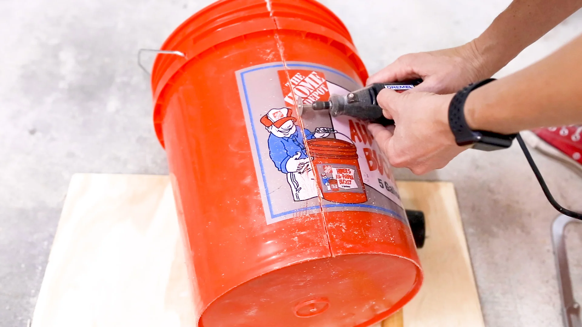 I then carefully made a cut down the side of the bucket with my Dremel