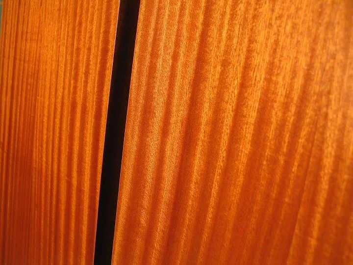 The new ribbon sapele wood that will replace the old mahogany - looks like tiger's eye stone!