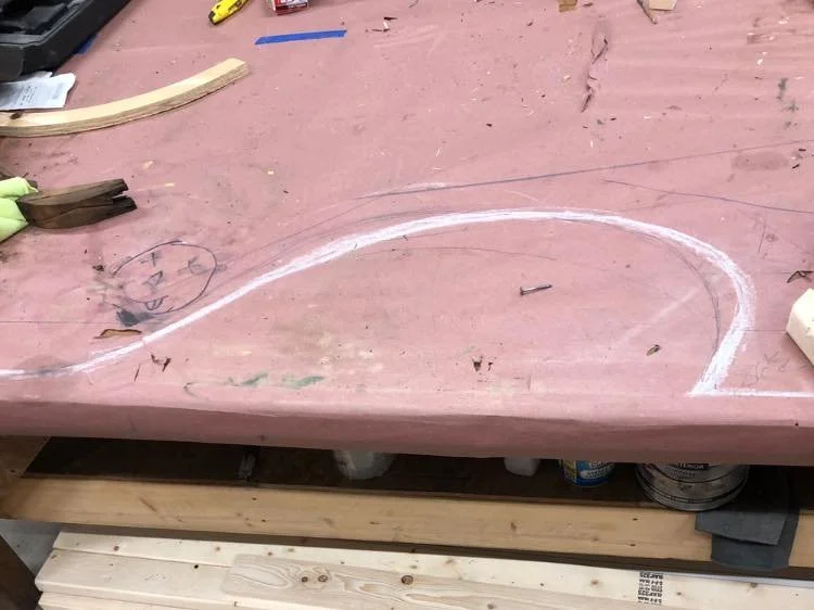 Sketching out the wheel well shape to match the original