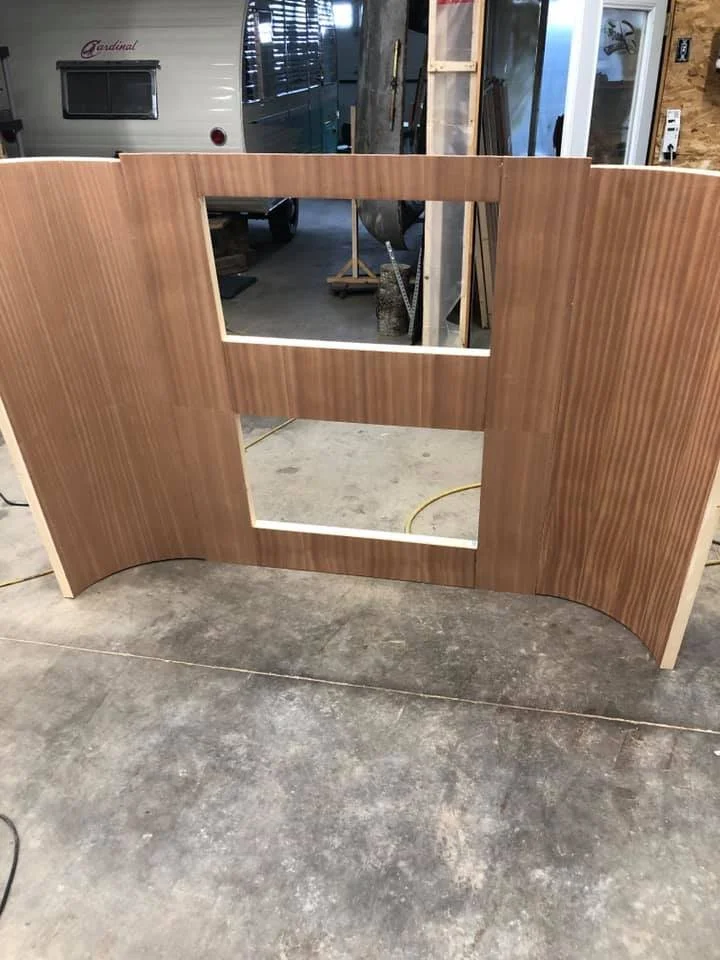 Interior wall paneling installed on new framing