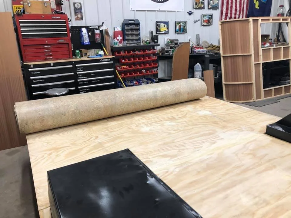 Getting ready to roll on the new linoleum