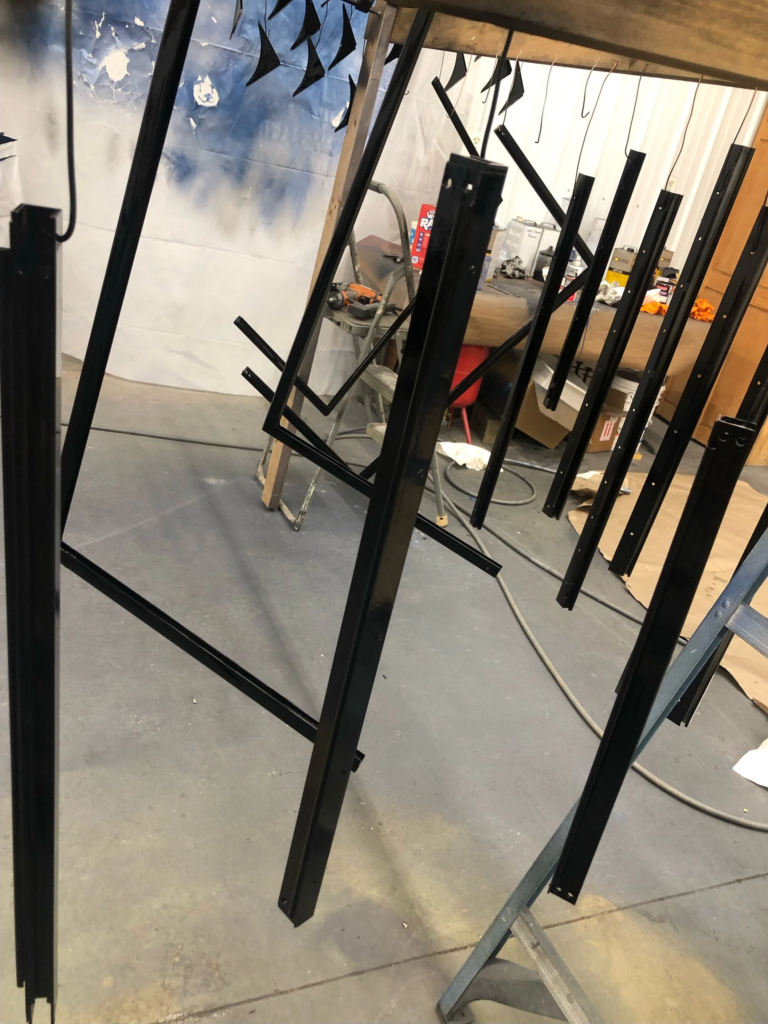 Damaged parts repaired or remanufactured, and painting begins