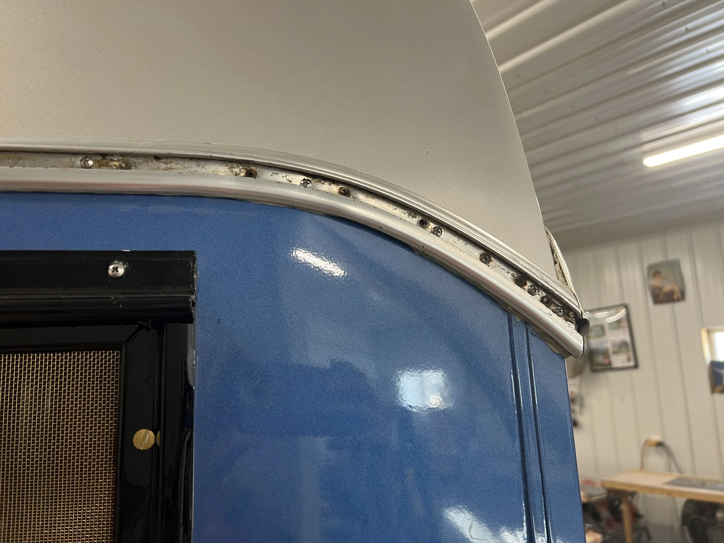 Original trim cleaned, polished, and reinstalled