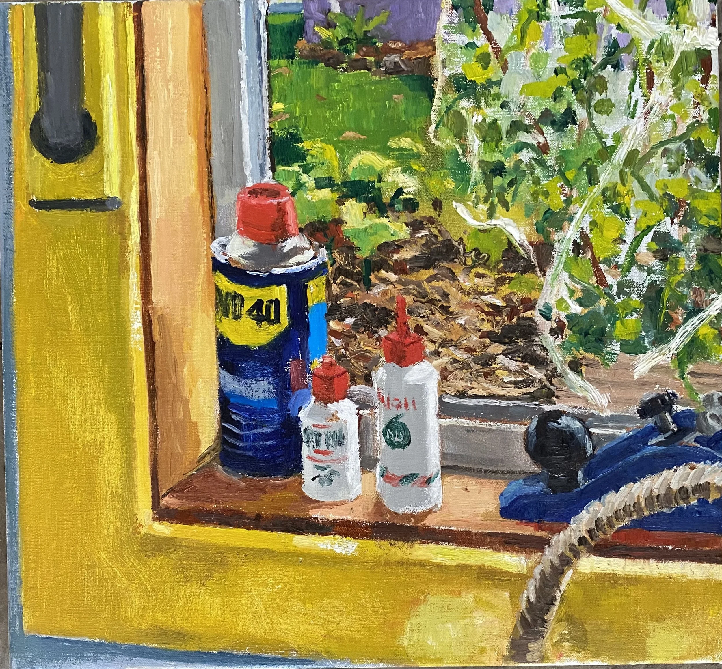 Windowsill with WD40 and plane