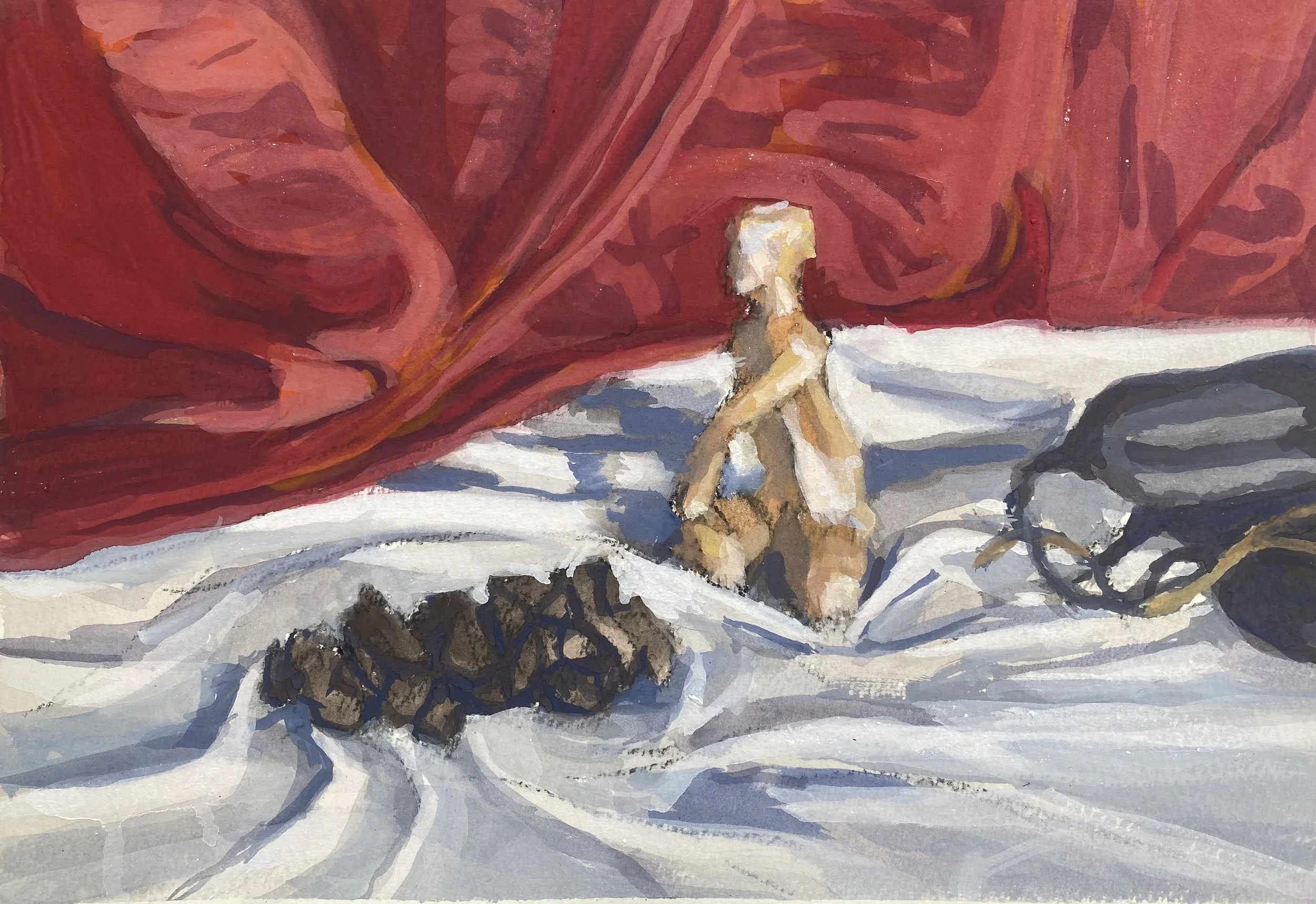 Figurine and banksia cone