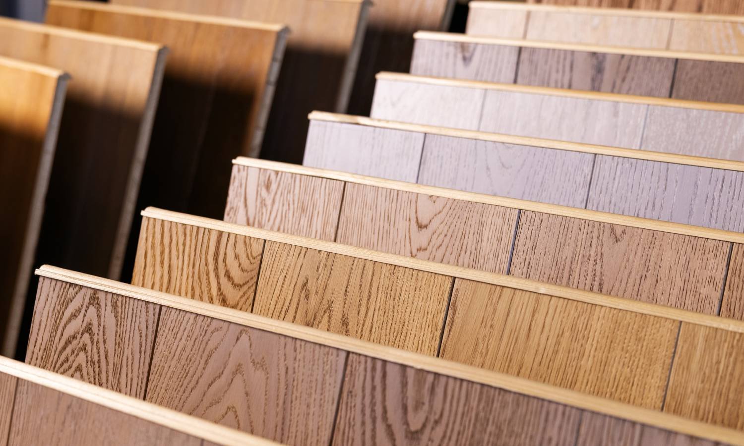 An image of several types of custom flooring samples for homeowners to choose from