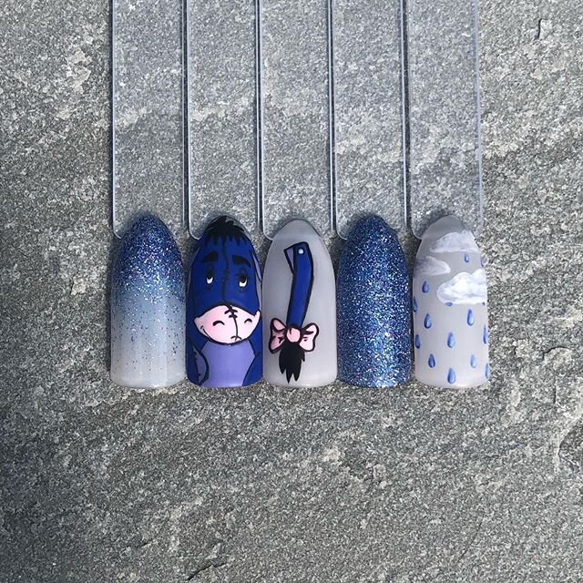&lsquo;Thanks for noticing me&rsquo; Eeyore 💙

All hand painted using a range of CND Shellac, Lecent&eacute; Create and Lecent&eacute; glitter 💙💜 #eeyore #eeyorenails #eeyorenailart #disneynails #disney #characternails #characterpainting #scratchm