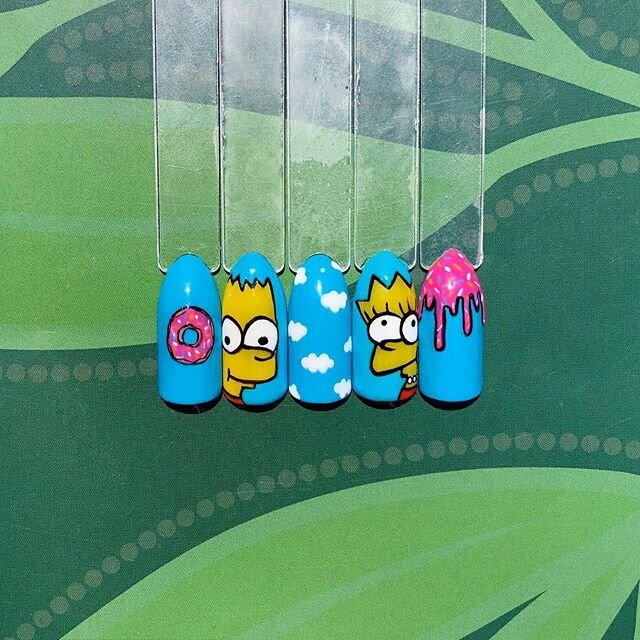 &lsquo;The Simpson&rsquo;s&rsquo; 🍩🍺 All hand painted using a range of CND Shellac, Lecenté Create and Lecenté tools 💛💙💗 #bartsimpson #lisasimpson #doughnut #thesimpons #thesimpsonsnailart #simpsonsnails #characternails #characterpainting #scr