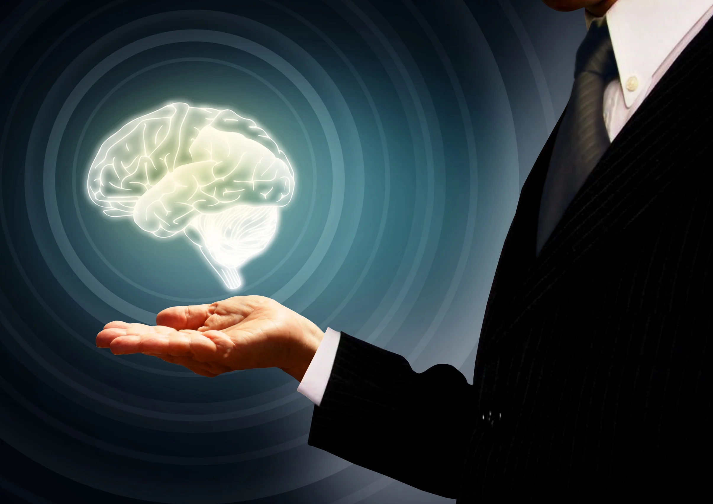stockvault--businessman-holding-a-brain-in-the-palm---skills-concept---concentric181166.jpg