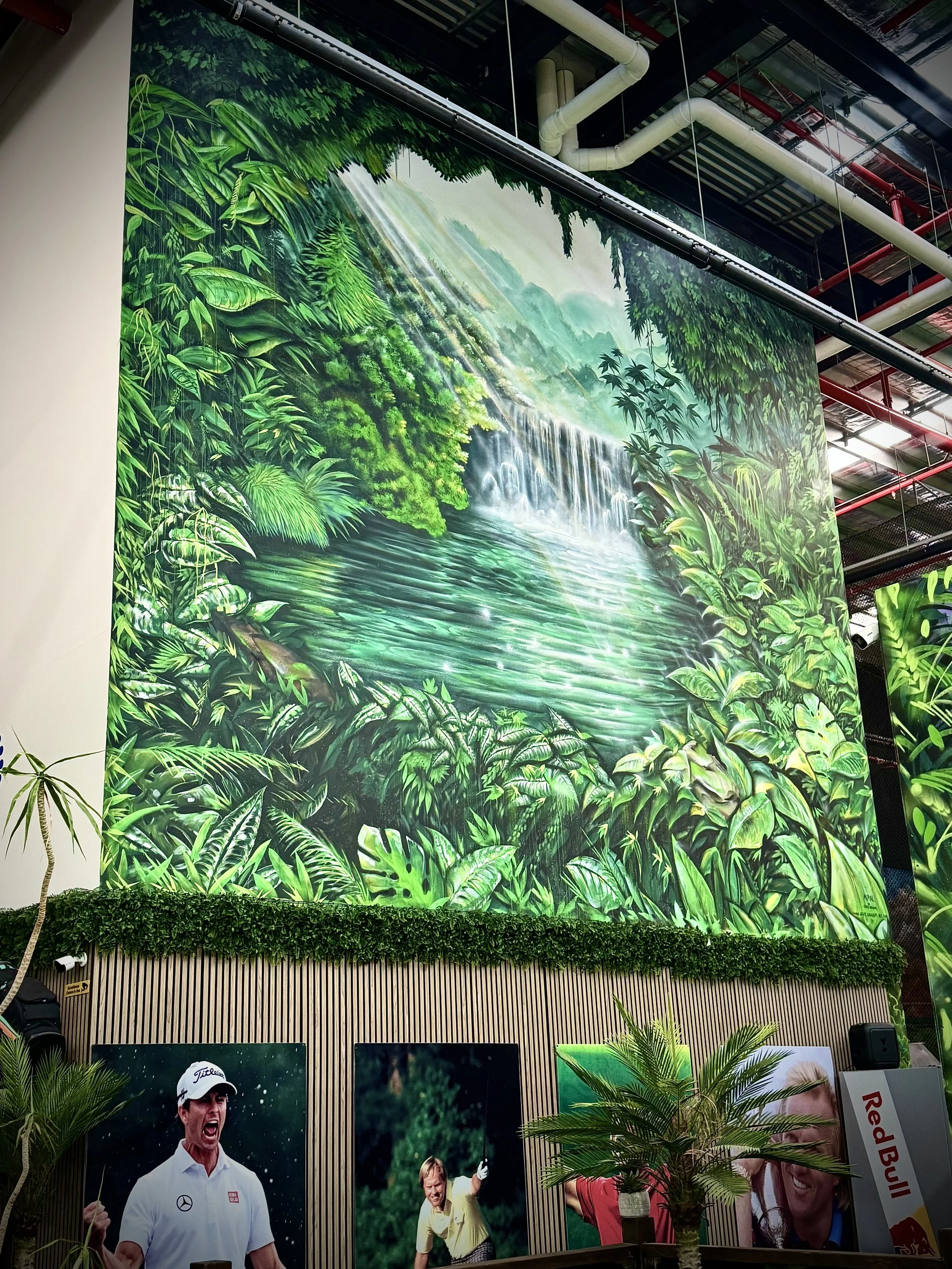 Tropical Jungle Waterfall mural painted inside Precision Golf Cromer on the Northern Beaches