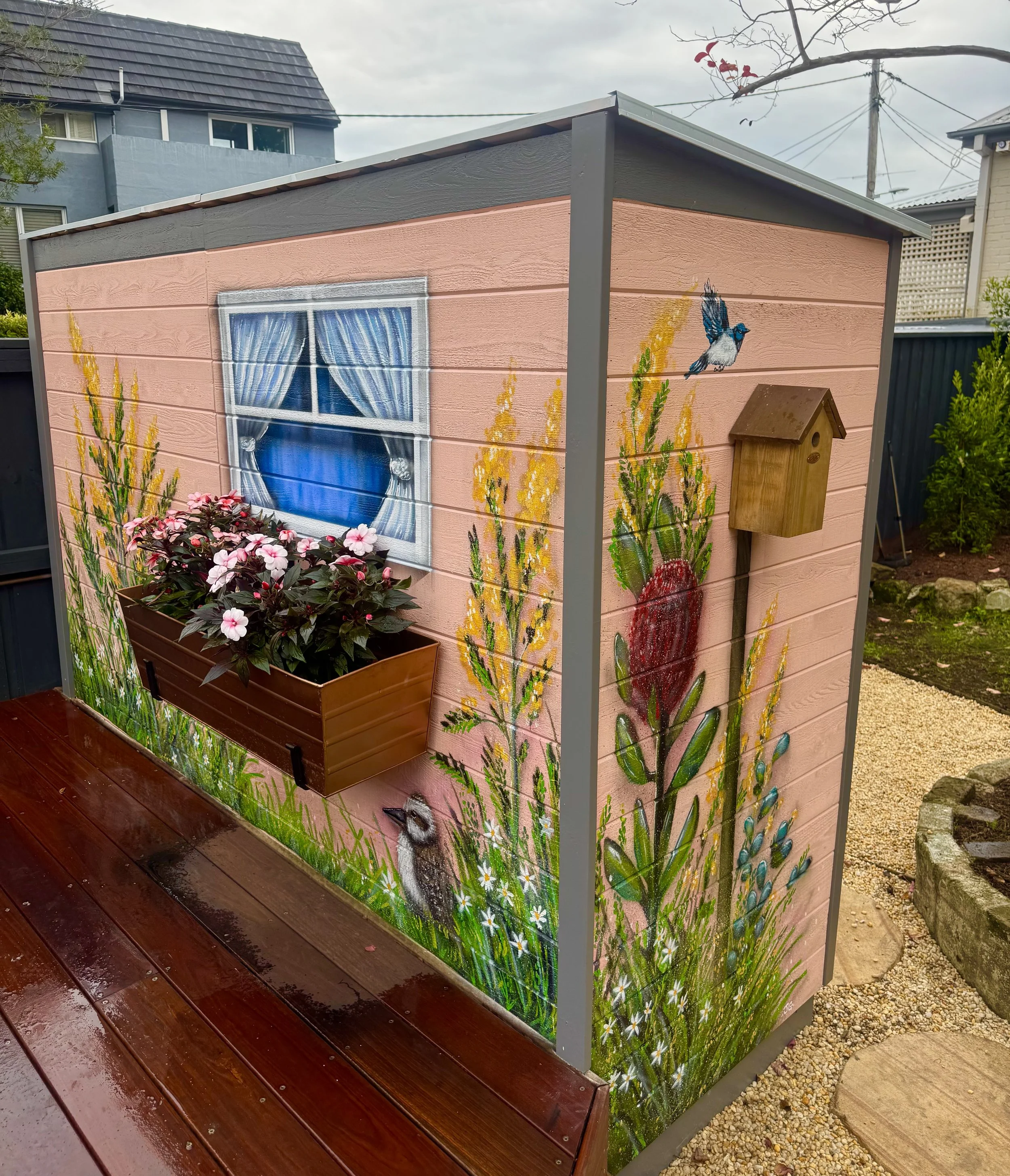 Native flower mural for garden shed in backyard of private residence in McMahons point North Sydney.