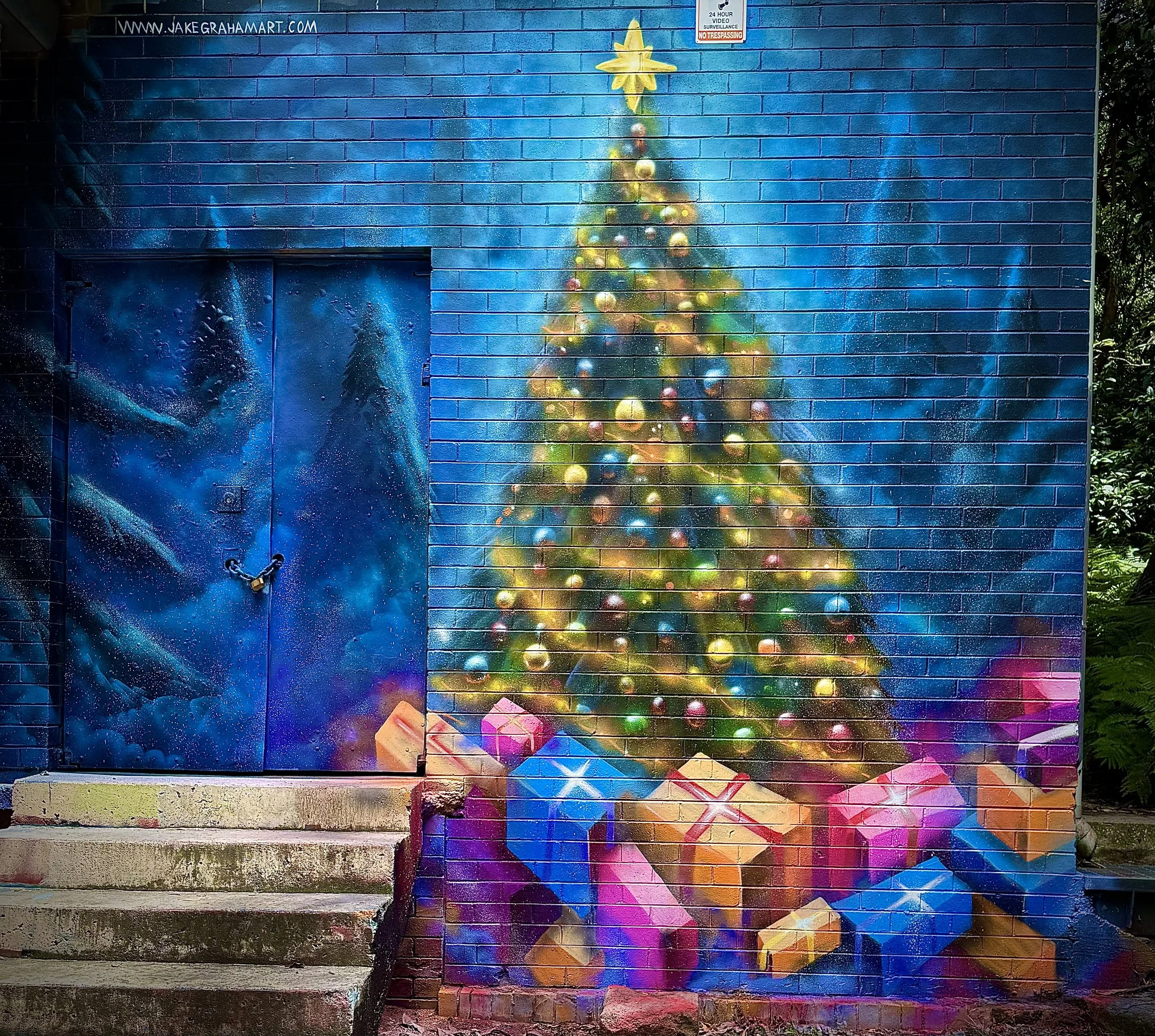 Christmas Tree Mural with presents painted for First Narrabeen Scout hall.
