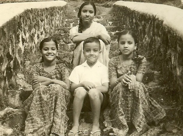 Sitting with three of my older sisters in Ooty, India in 1965. Shortly after this photo was taken, my sister Suda (right) died of Typhoid, at the age of 11. The use of antibiotics was not widespread in India at the time.