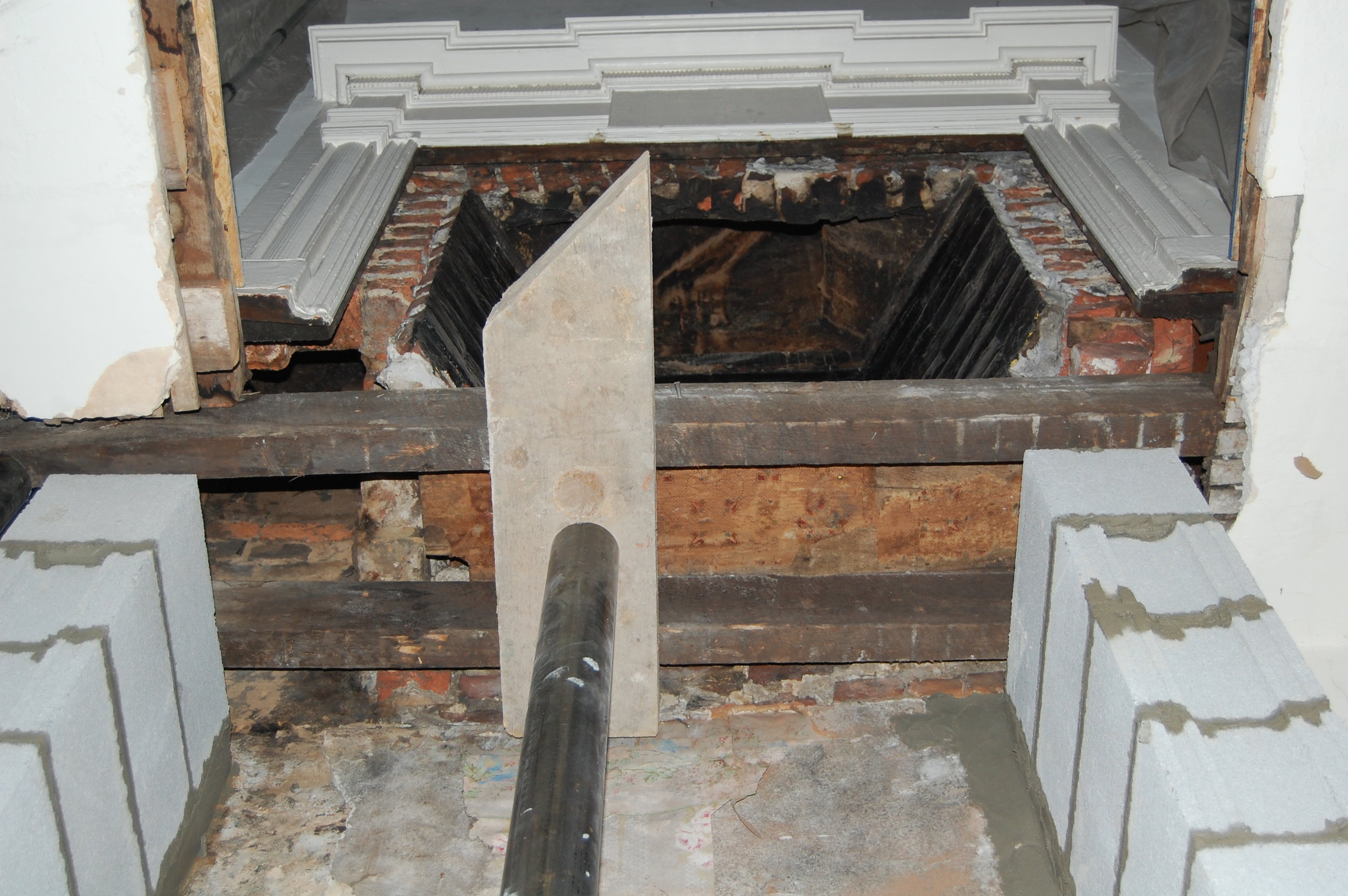 Structural support for historical fireplace