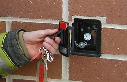 Building keys stored securely inside a recess mounted Knox Box