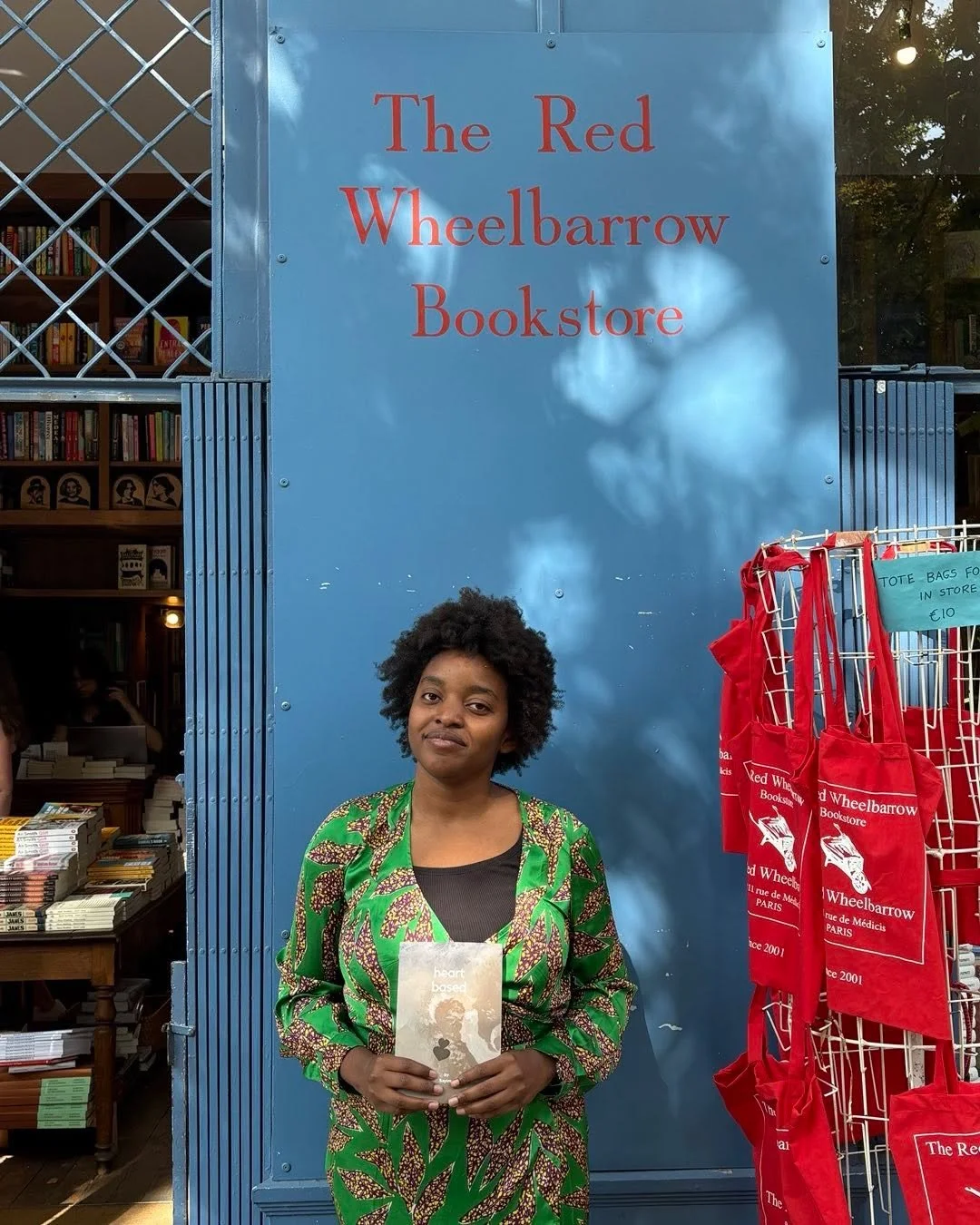 @sssayima at the bookshop with her volume of poetry called &acute;heart  based