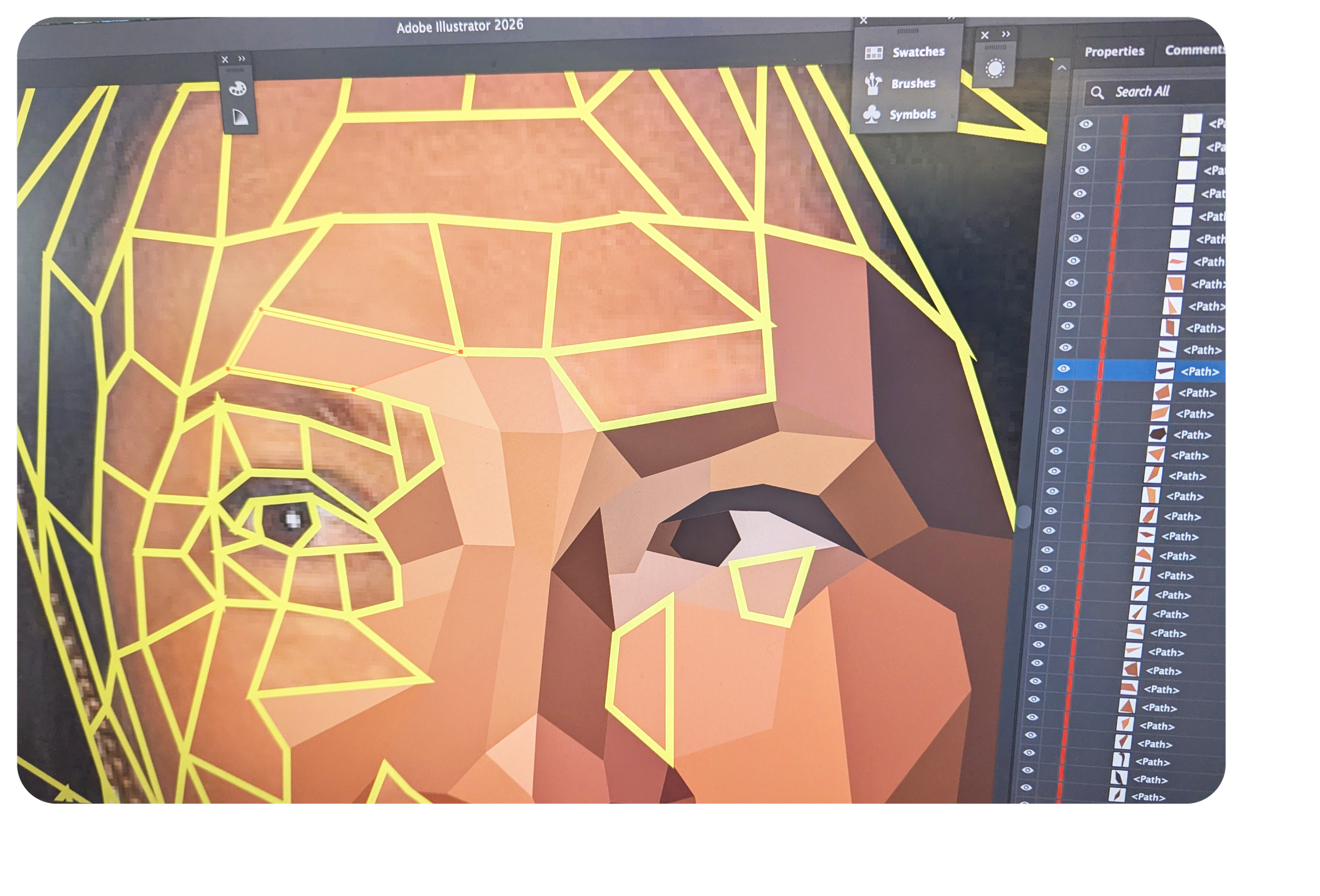 An image of computer screen with a woman's face being drawn in low-poly style.
