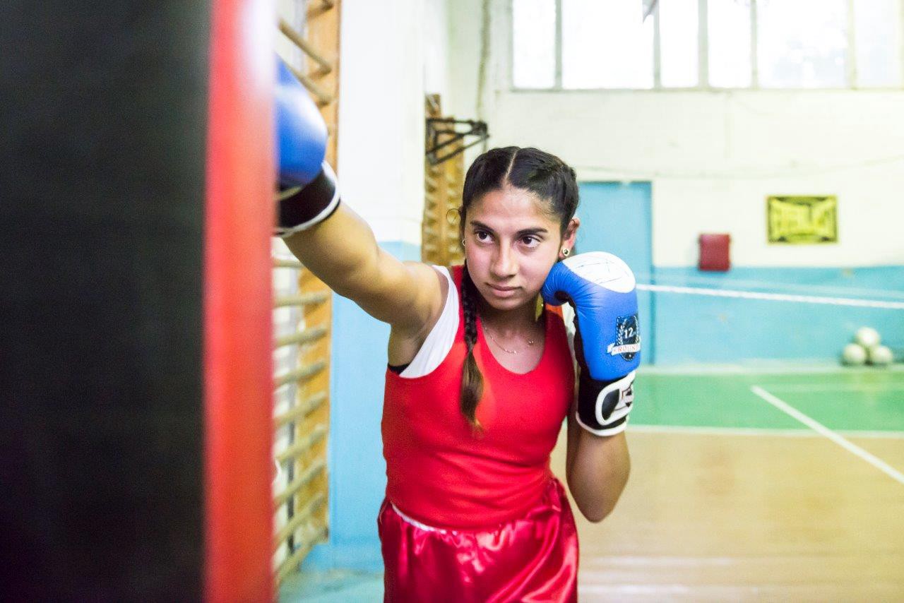 After winning several medals at regional competitions in Maldova, 16-year-old Stela now dreams of becoming an Olympic boxer. (Courtesy of UN Women Moldova)