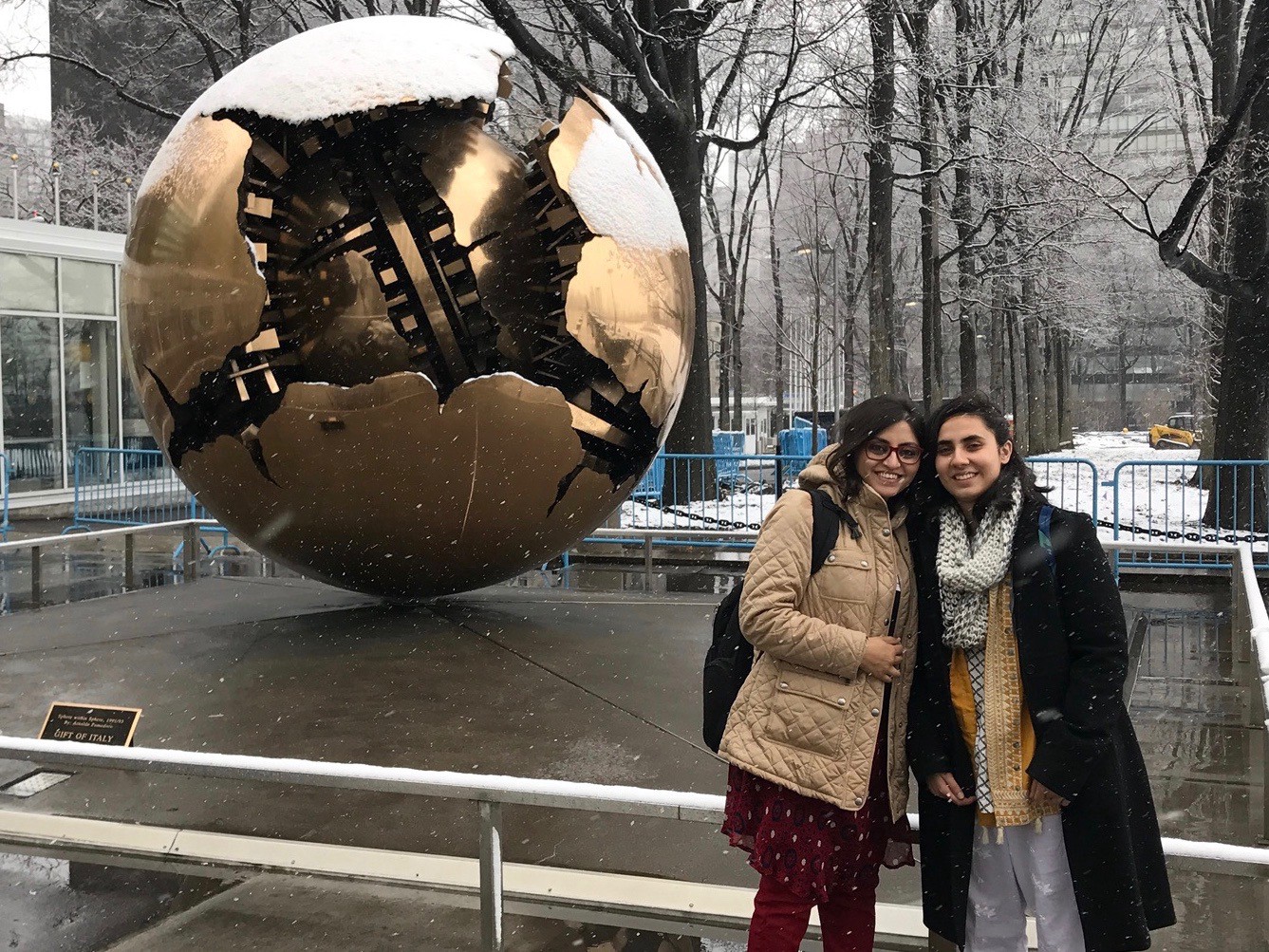 Noorena and Gulalai in front of the UN — it was their first time seeing snowfall! (Courtesy of Tess Thomas / Malala Fund)