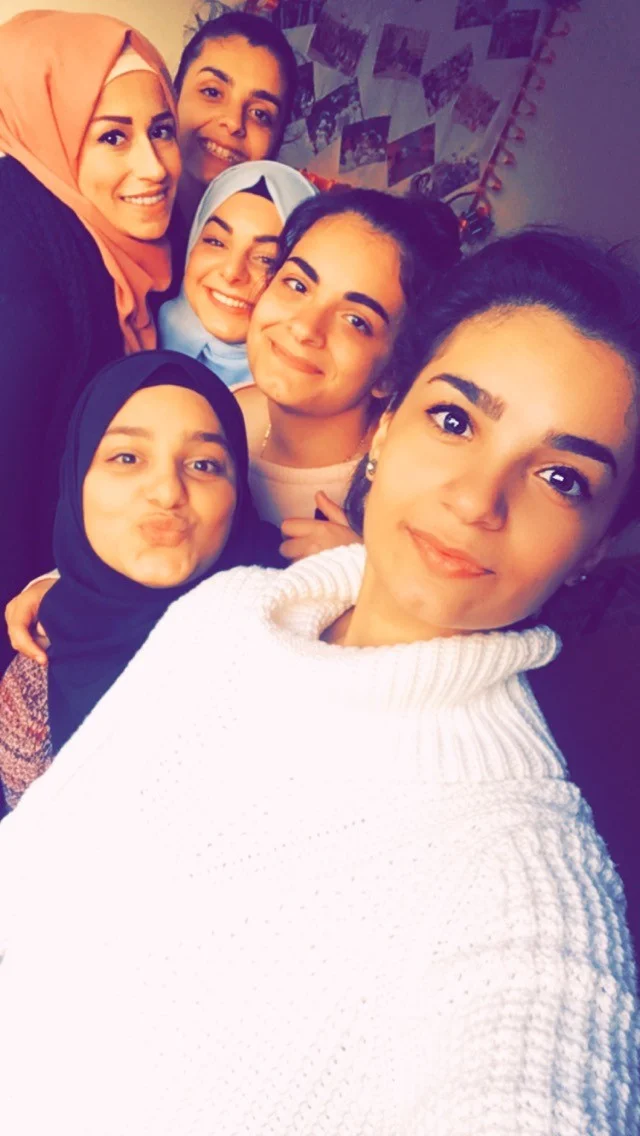 Sally, the social worker at Naba’a organization, my sisters Sara and Zeina, and my lovely friends Nour and Anwar. All of us participate in the Naba’a girls’ education project. (Courtesy of Huda)